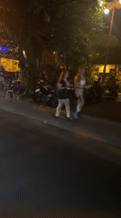 Evening street life and birthday celebration documented in North Kuta