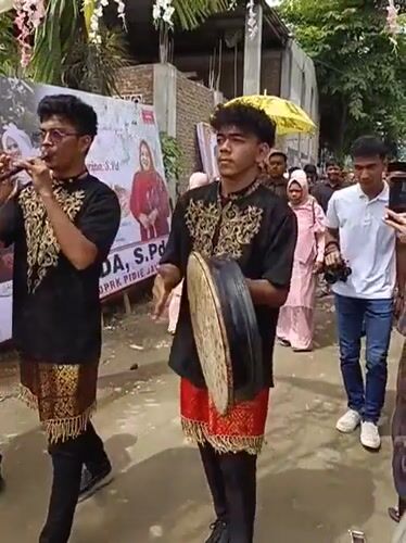 Traditional Acehnese wedding procession with live music, Aceh