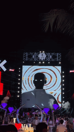 Outdoor nighttime event with live performance in Bai Chay, Vietnam