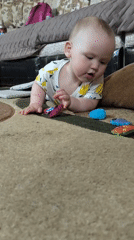 Quiet residential moments: baby, backyard playset, garden view