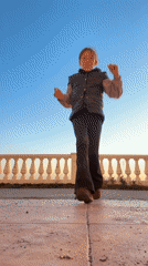 Girl observed at oceanfront balustrade during sunset in Sochi