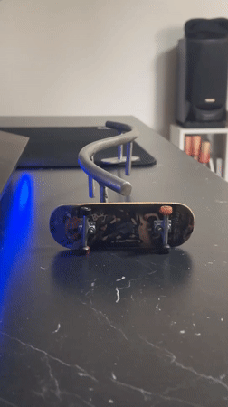 Fingerboard practice session captured in Yekaterinburg home setting