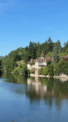 Sunny river and village scenes captured in French countryside