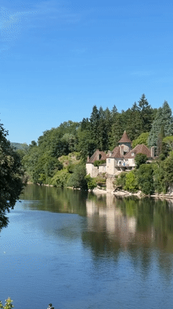 Sunny river and village scenes captured in French countryside