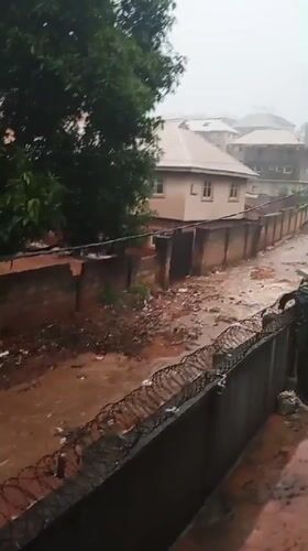 Heavy rains flood residential street in Nkpor, Nigeria
