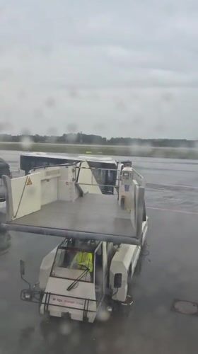 Rainy evening airport operations documented at Luxembourg Findel