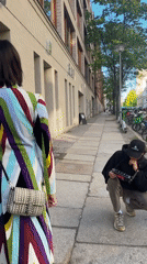 Street photo shoot observed in Berlin featuring colorful coat