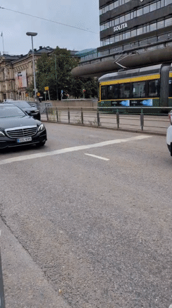 Helsinki morning walk captures architecture, dining, street life