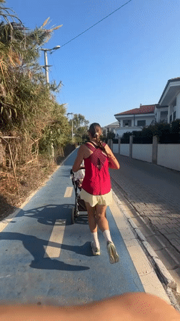 Early morning stroller activity observed along Fethiye waterfront paths