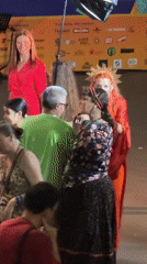 Theatrical stage performance in Moscow, red dress and gold crown