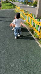 Woman and girl enjoy outdoor bike ride and playground visit