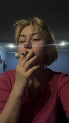 Woman smoking cigarette observed in Odesa, Ukraine