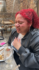 Person experiences coughing fit during outdoor lunch in London