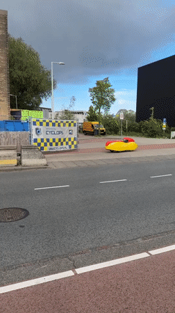 Small vehicles spotted parked along Amsterdam streets near construction