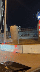Nighttime traffic navigates construction zone in Saint Petersburg