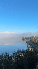 Morning fog blankets Votkinsk Reservoir at dawn