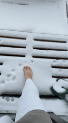 Woman with cat spotted in snowy Russian village