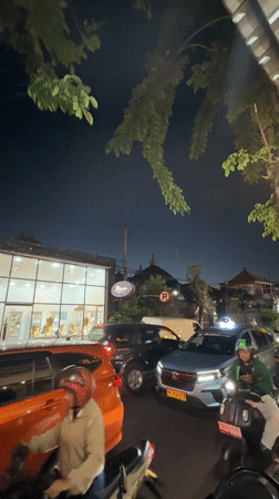 Kuta nightlife scene captured across bars, restaurants, streets