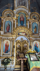 Golden iconostasis and bible captured in Kyiv church video
