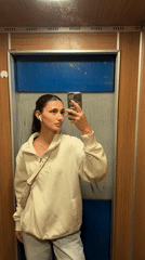 Woman takes elevator selfie in Bar, Montenegro