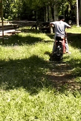 Morning life documented in Meunasahalue: residents, scooters, grazing sheep