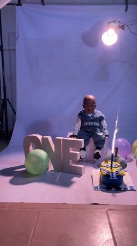 Child poses in traditional Igbo attire in Barakin Akawo