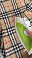 Manchester residents document afternoon ironing and organized indoor workspace