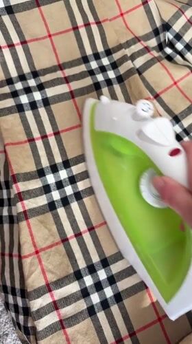 Manchester residents document afternoon ironing and organized indoor workspace