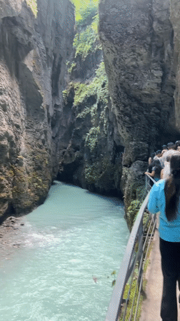 Turquoise river gorge walk, Swiss canyon, summer