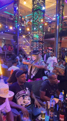 Nigerian communities document mixed street life and nightlife scenes