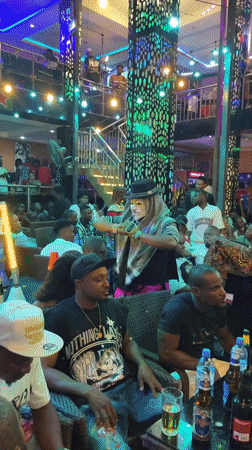 Nigerian communities document mixed street life and nightlife scenes