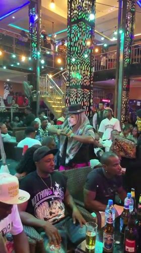 Nigerian communities document mixed street life and nightlife scenes