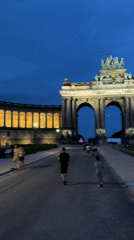 Brussels' Cinquantenaire arch lit up at dusk