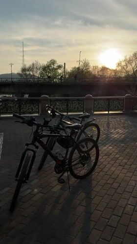 Sunset evening walk documented along Birobidzhan river embankment
