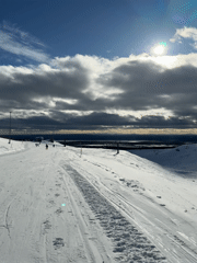 Skiing activity documented on Kirovsk slopes under cloudy skies