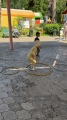 Street performer entertains families at Chaikovsky park Sunday morning