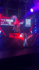 DJ performs during heavy rainfall in Choeng Thale, Thailand