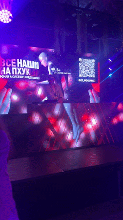 DJ performs during heavy rainfall in Choeng Thale, Thailand