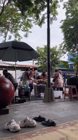 Street market activity in Purwodadi, Indonesia