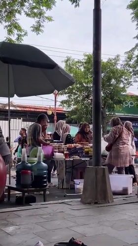 Street market activity in Purwodadi, Indonesia