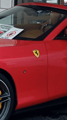Ferrari sighting and bustling street life observed across Barcelona