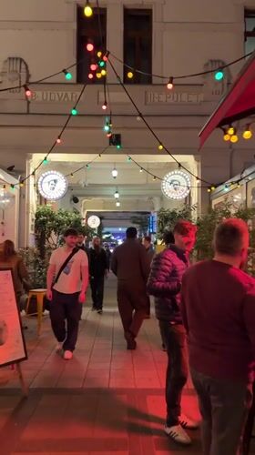 Evening social activity documented across Budapest entertainment district