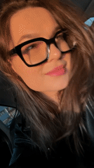 Woman photographed in car during afternoon in Izhevsk