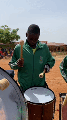 Youth groups perform drills and music at Nigerian field