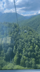 Cable car rider captures scenic mountain views in Estosadok