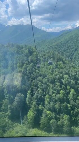 Cable car rider captures scenic mountain views in Estosadok