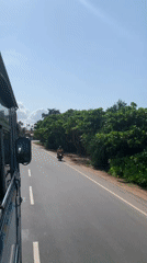 Early morning coastal road travel captured in Midigama, Sri Lanka