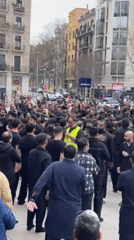 Large rally with Arabic banners held at Barcelona's Arc de Triomf