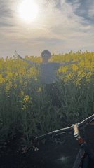 Woman enjoys sunny afternoon in Bulgarian flower field