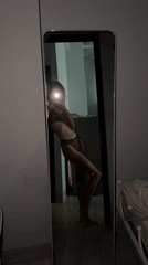 Person takes mirror selfies in leopard bikini in Vietnam